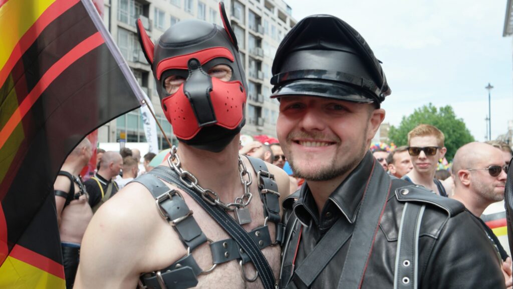 A handler and his pup during puppy play